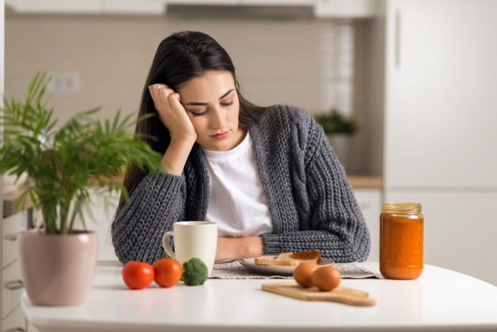 Tired person feeling weak due to hunger